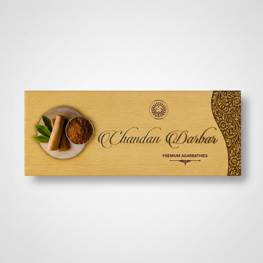 Chandan Darbar packaging with agarbatti and leaves on a wooden background